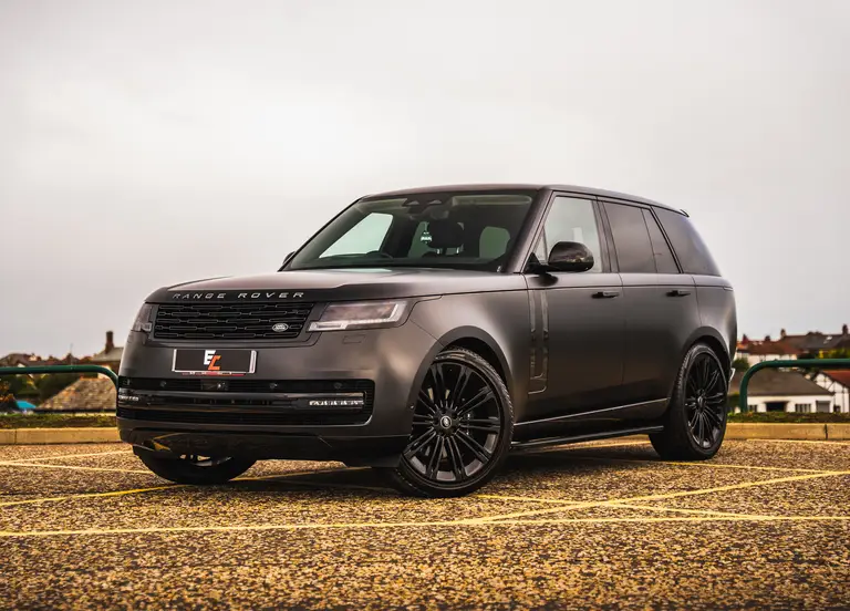 Range Rover + £5,000 Cash